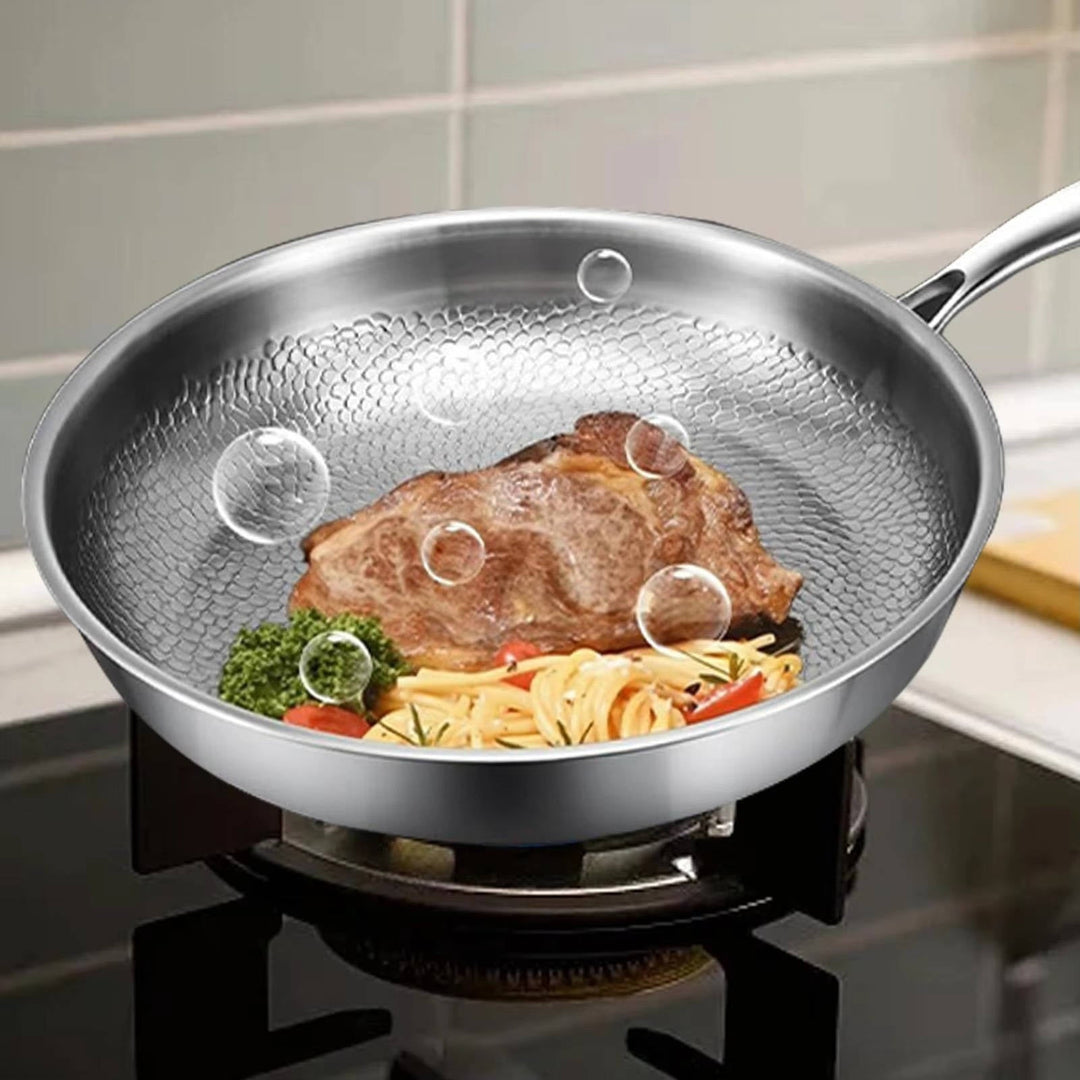 Deep non-stick titanium frying pan for versatile healthy cooking, ensuring even heat & easy cleanup.