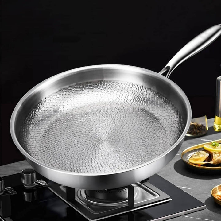 Effortless healthy cooking with this deep non-stick titanium frying pan, providing even heat distribution.