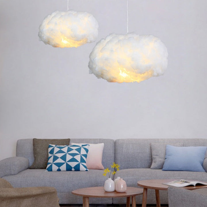 "Dreamy cloud chandelier with soft, fluffy cotton design emits warm, inviting glow for cozy home lighting ambiance."
