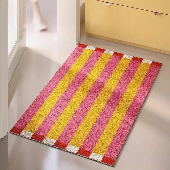 Chic striped PVC doormat, ideal for indoor or outdoor entry. Durable welcome floor mat.