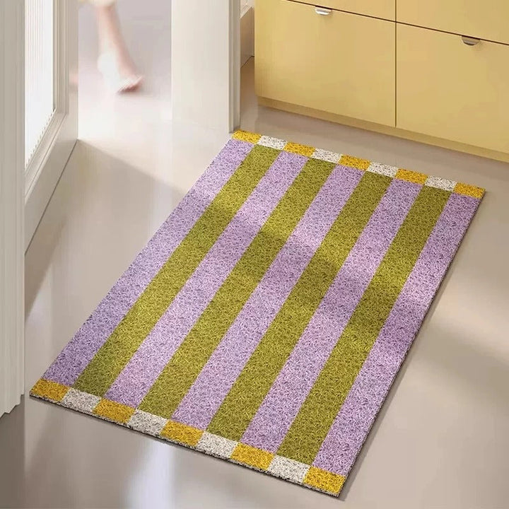 Modern striped PVC floor mat. A durable doormat for stylish outdoor or indoor entryways.