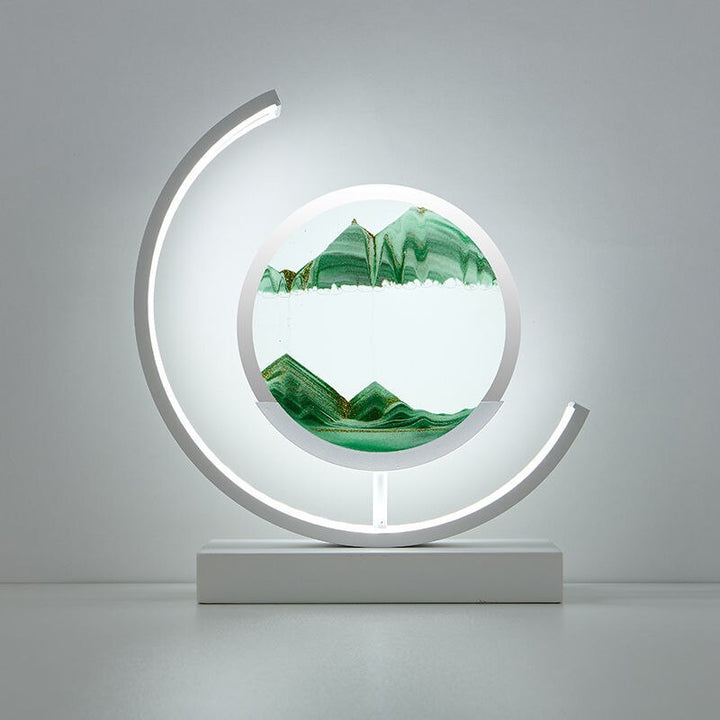 Dynamic Sand Art LED Table Lamp with flowing sandscapes and soft lighting, perfect for home or office decor transformation.