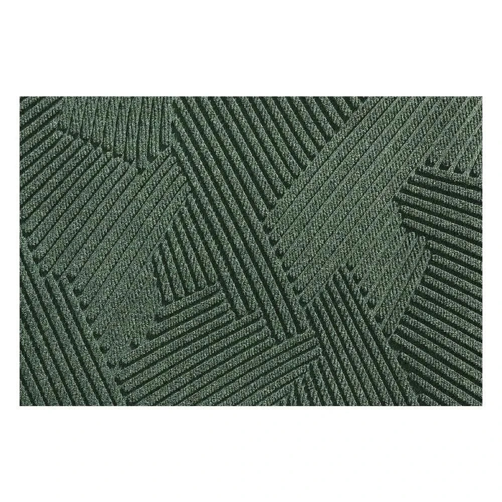 Eco-friendly non-slip doormat for home entrances. Durable polypropylene indoor/outdoor mat for dirt trapping.