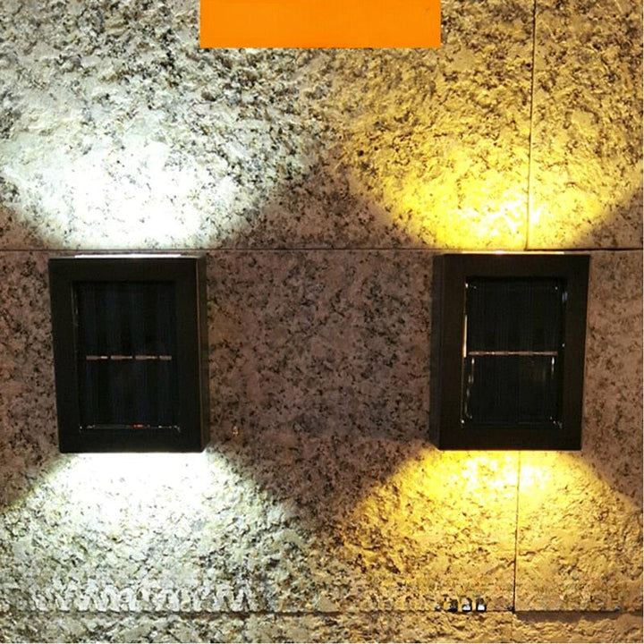 Eco-friendly outdoor solar wall light with modern design, emits warm glow, weather-resistant for gardens and patios.