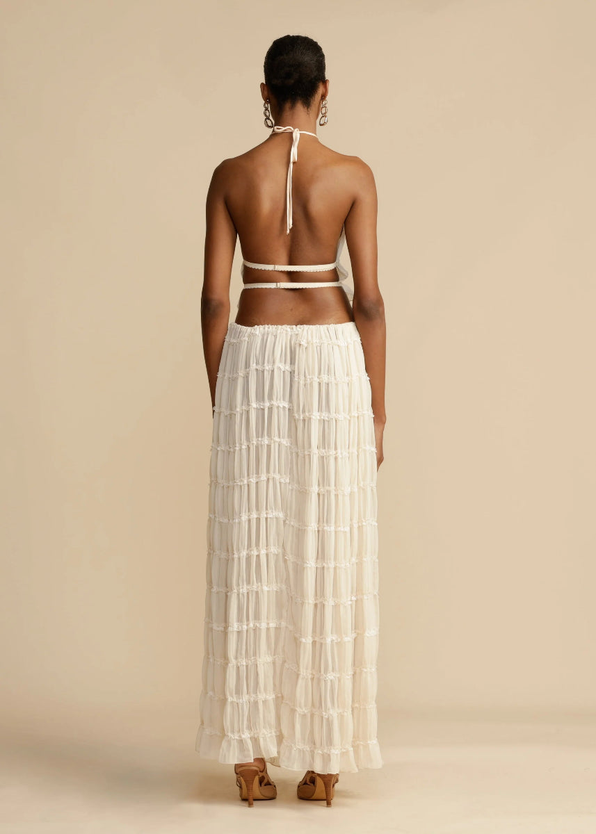 Chic women's two-piece maxi skirt set, perfect summer vacation, beach, or resort wear outfit.