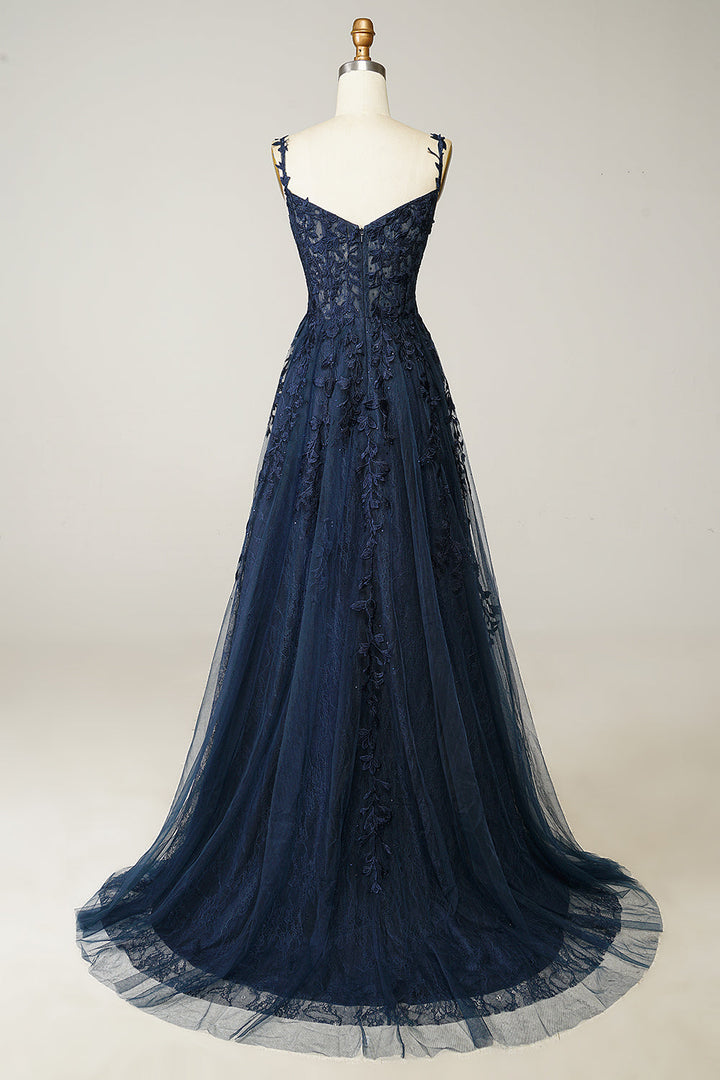 Stunning navy blue A-line ball gown featuring delicate appliques & spaghetti straps, ideal for evening wear.