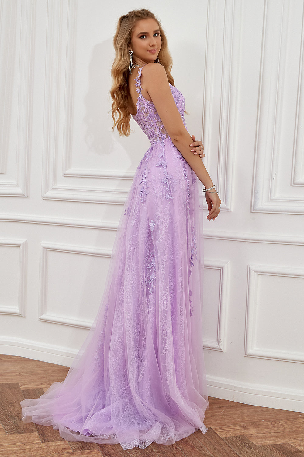 Chic prom dress: A-line silhouette, delicate appliques, and elegant spaghetti straps for a perfect look.