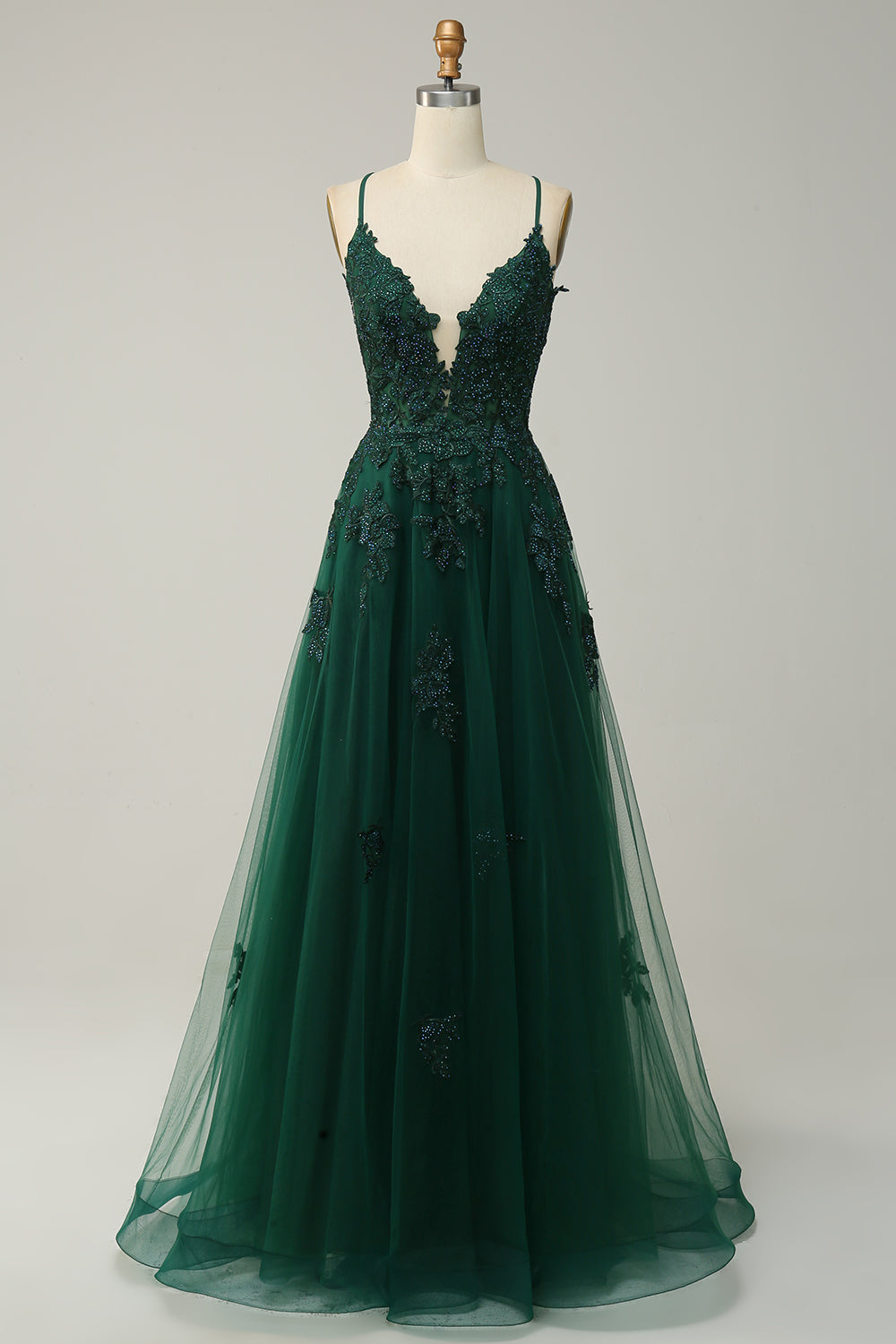 Long A-line prom dress with delicate appliqués, ideal for an elegant evening.