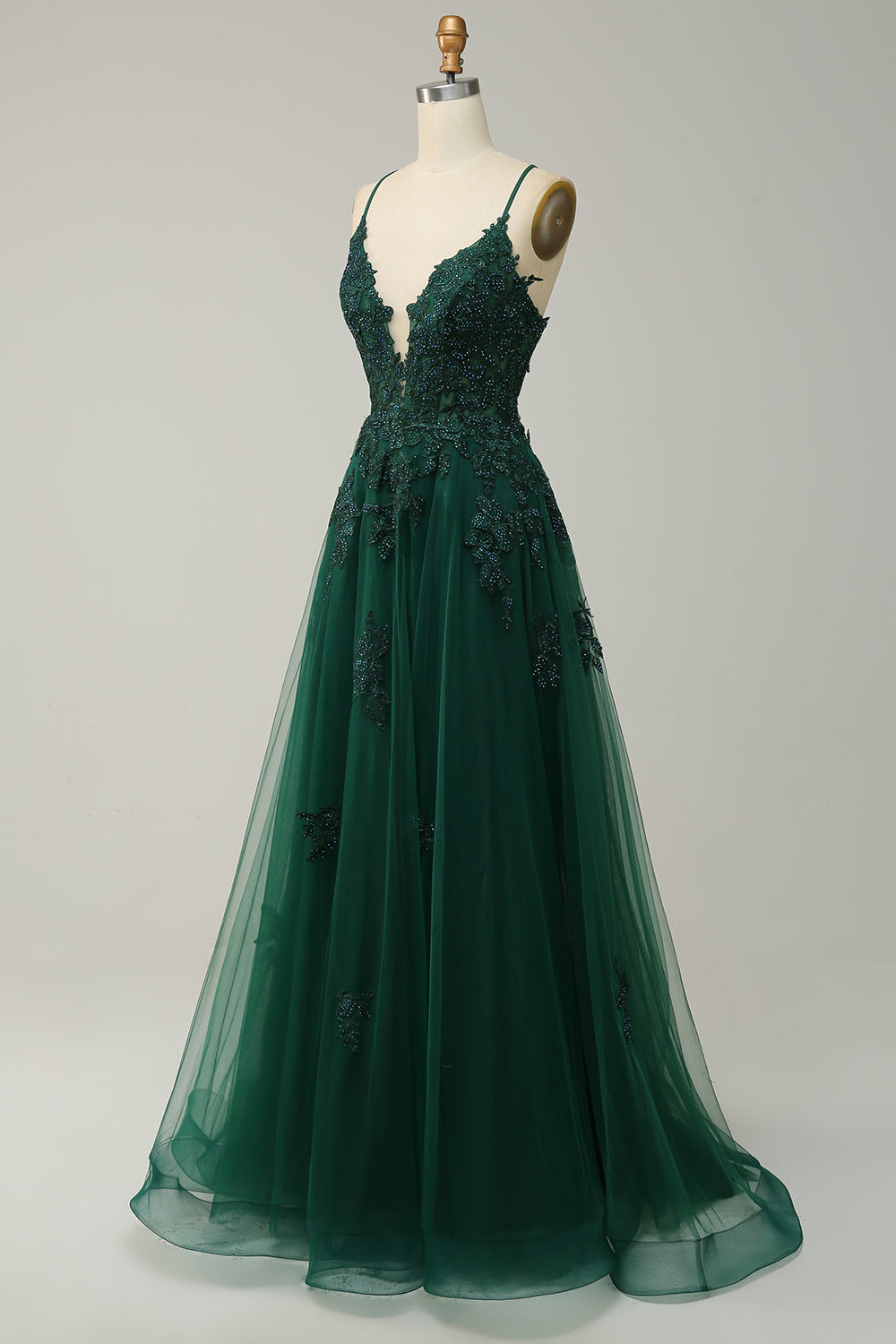 Flowing A-line evening gown for women, delicate lace-like appliqués detail.