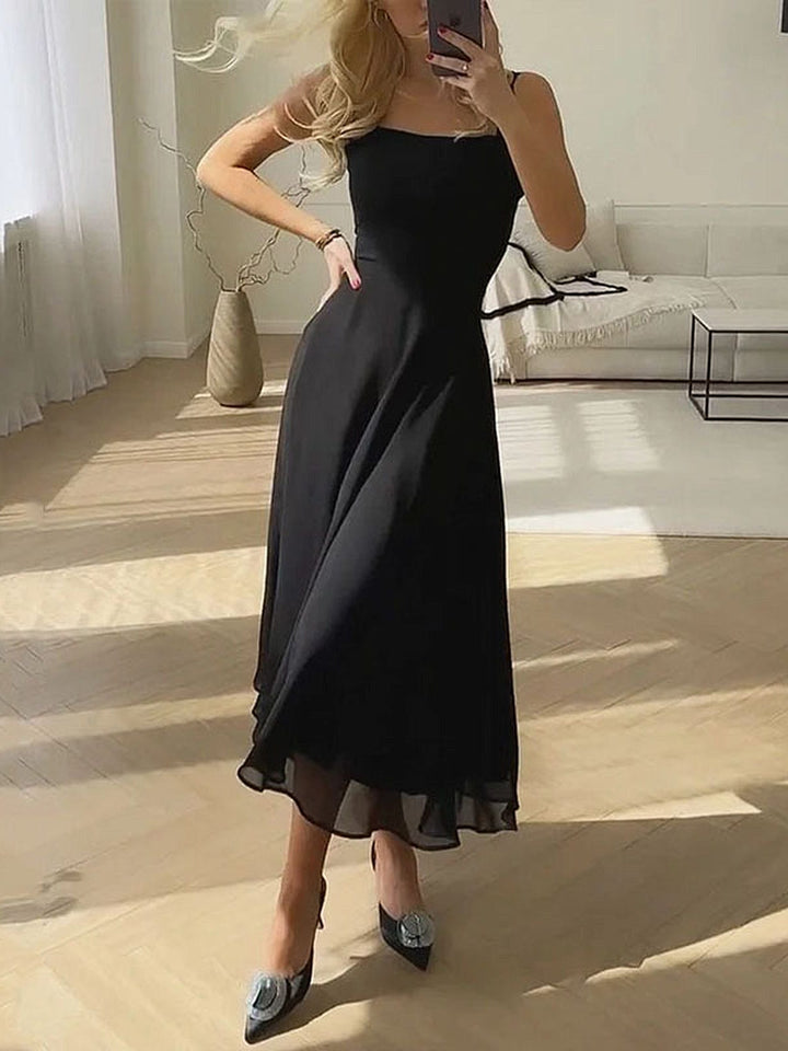 Elegant women's A-line midi dress, perfect for summer, parties, or as a sophisticated wedding guest outfit.