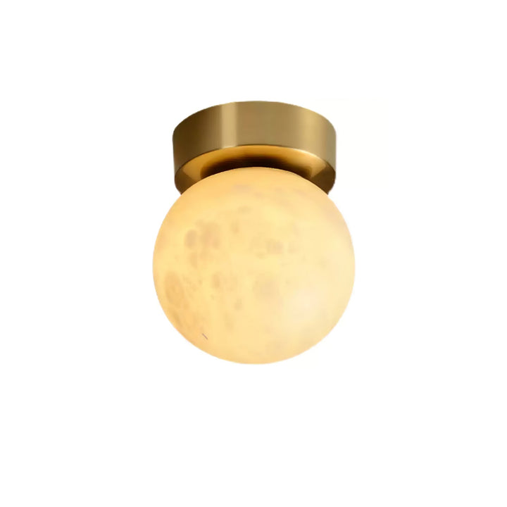 Elegant alabaster brass ceiling lamp, warm ambient light, celestial glow, sophisticated brass detailing, modern design.