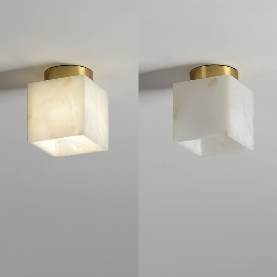 Elegant alabaster brass ceiling lamp, warm ambient light, celestial glow, sophisticated brass detailing, modern design.
