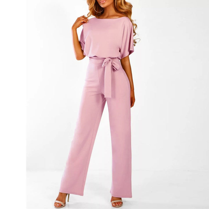 "Elegant black women's belted wide-leg jumpsuit, chic design accentuates waist for a sophisticated look, versatile style."