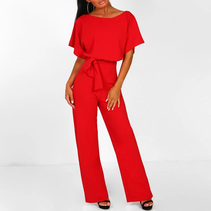 "Elegant black women's belted wide-leg jumpsuit, chic design accentuates waist for a sophisticated look, versatile style."