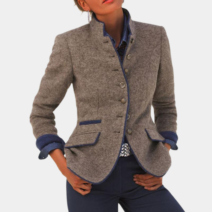 Versatile women's tailored blazer in brown, offering a polished look for professional or elegant everyday wear.