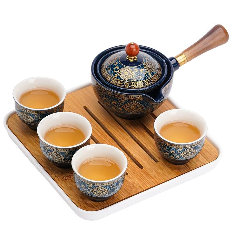 "Elegant ceramic rotating Japanese tea pot set with infuser, showcasing handcrafted artistry and traditional design in blue."