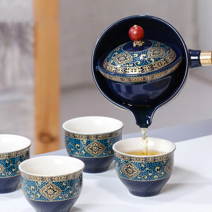 "Elegant ceramic rotating Japanese tea pot set with infuser, showcasing handcrafted artistry and traditional design in blue."