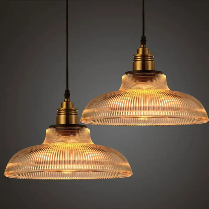 Elegant CrystalLoom glass pendant light with metal accents, perfect modern ceiling lighting for home decor.