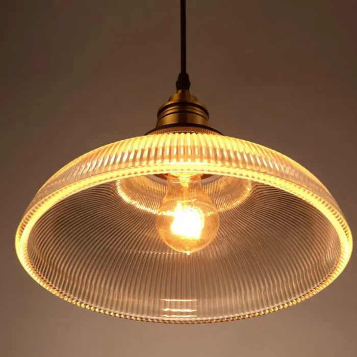 Stylish CrystalLoom glass pendant light enhances home decor; a modern ambient lighting solution for interiors.