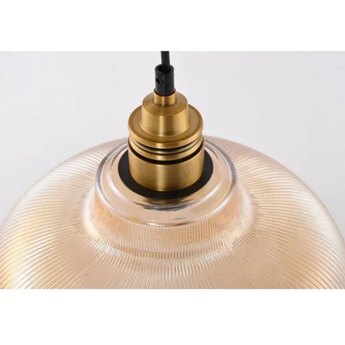 Close-up of CrystalLoom elegant glass pendant light, showcasing metal and glass details for modern homes.
