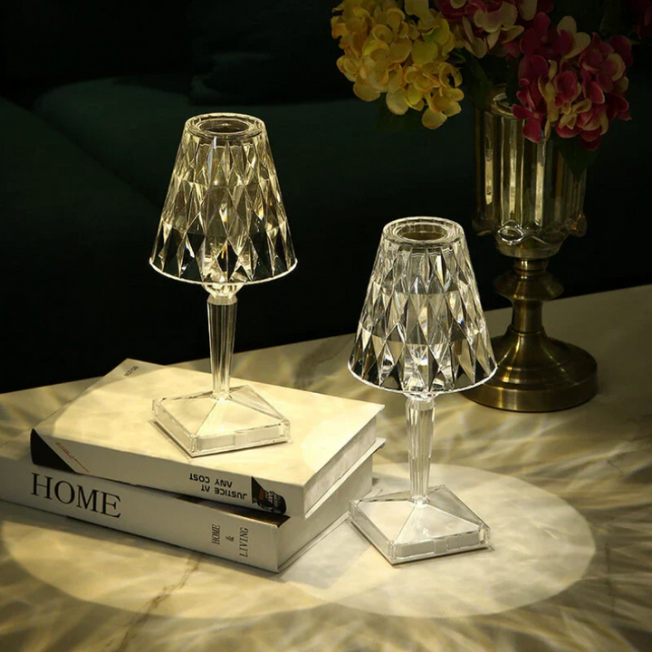 Sculptural crystal lamp, casting beautiful light, perfect for elegant home decor.