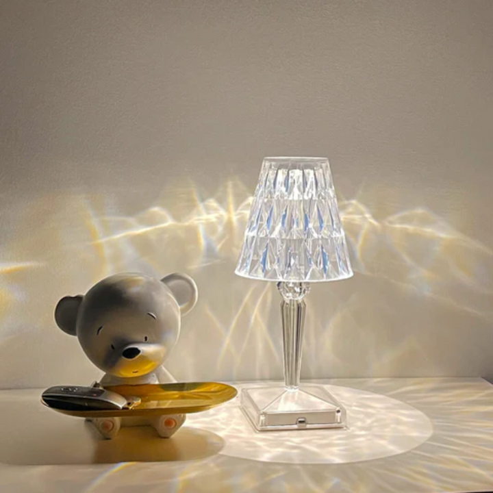 Opulent crystal table lamp, creating a rich atmosphere with its elegant design.