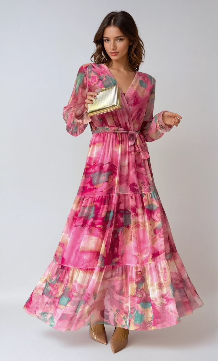 Stylish dark pink floral tiered wrap maxi dress for women. Long sleeve v-neck design, perfect for elegant evening wear.