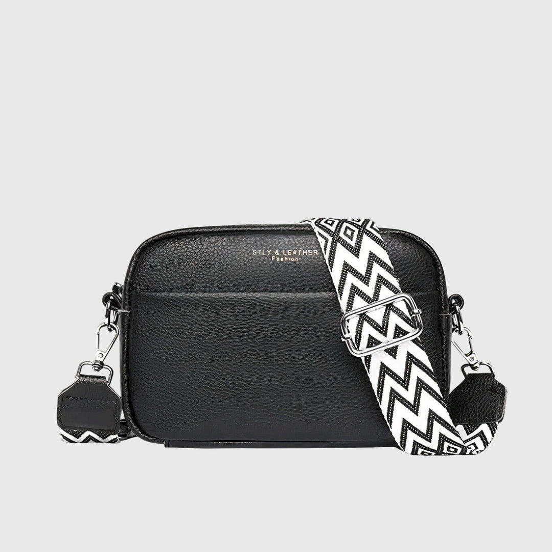Elegant faux leather shoulder bag for women, perfect as a stylish everyday handbag or crossbody purse.