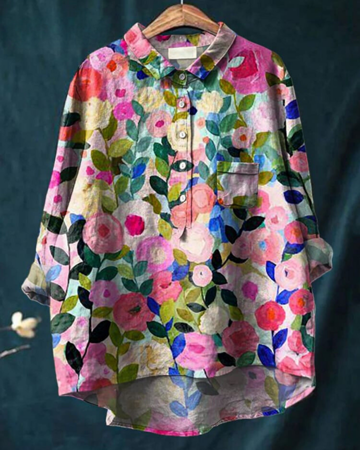 Elegant floral blouse for women, lightweight & flowing, perfect for spring/summer fashion.