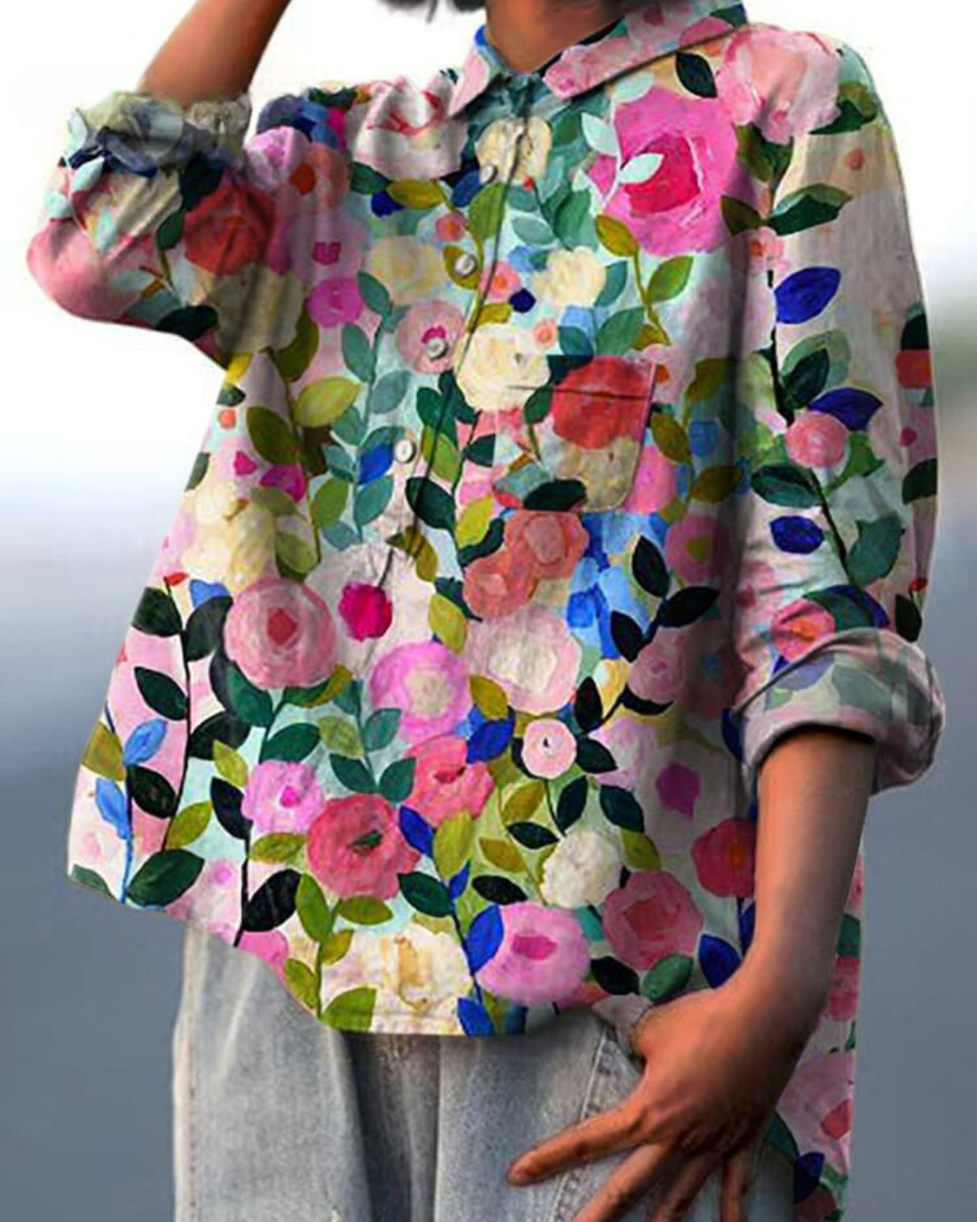 Beautiful patterned floral blouse, a flowing women's top for elegant spring/summer fashion.