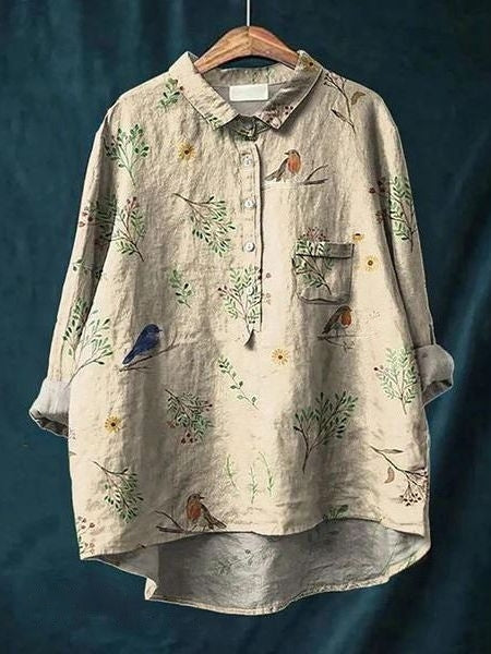 Comfortable & flowing women's floral blouse with vibrant print, elegant ladies fashion top.