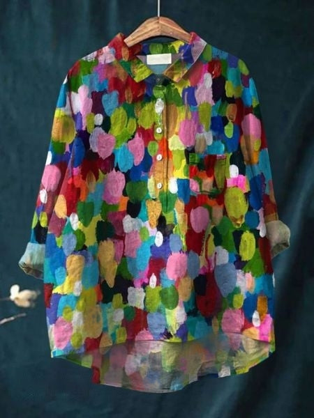 Elegant women's flowing top, a vibrant patterned floral blouse for spring and summer style.