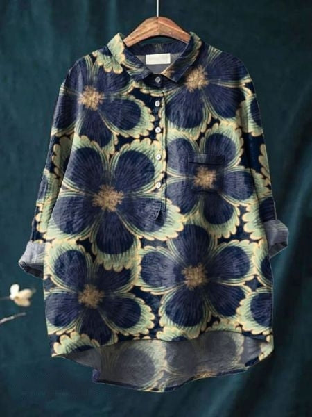 Vibrant patterned floral blouse, a flowing women's top for elegant spring and summer outfits.