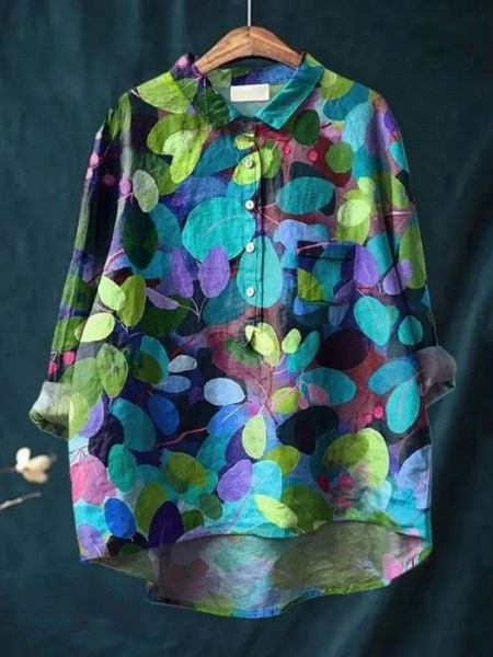 Elegant women's floral blouse, a perfect flowing top for spring outfits or summer style.