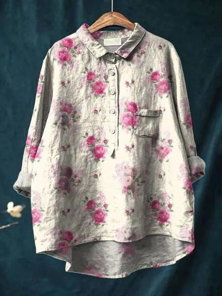 Flowing tunic style floral blouse for women, elegant and comfortable, great for casual chic.
