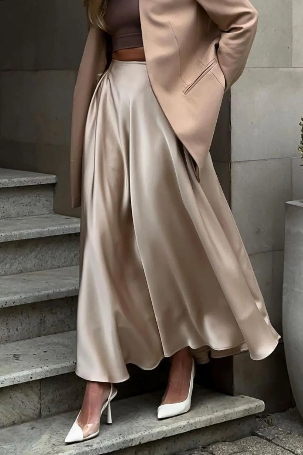 Elegant flowing maxi skirt for women, perfect for summer and special occasions. High-waist design.