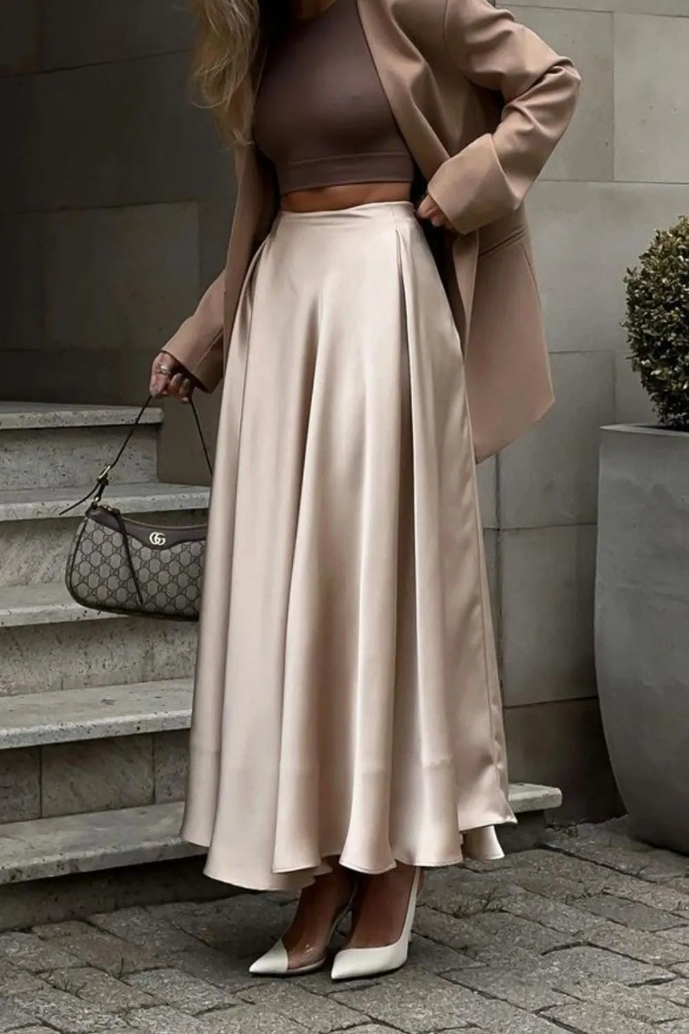 High-waist flowy maxi skirt, a versatile women's piece for office, evening, or casual wear.