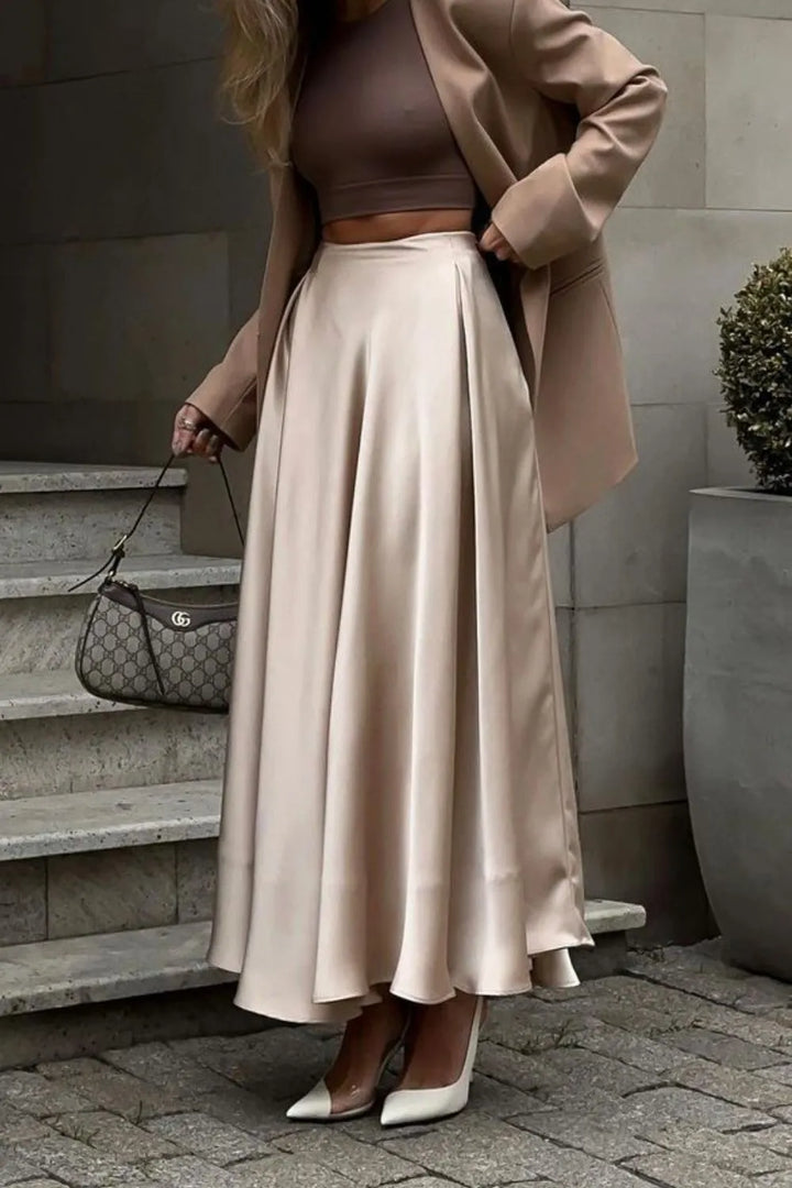 High-waist flowy maxi skirt, a versatile women's piece for office, evening, or casual wear.