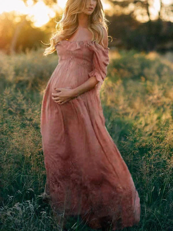 Women's comfortable flowy off-shoulder maxi maternity dress. Stylish pregnancy wear, perfect for everyday or special events.