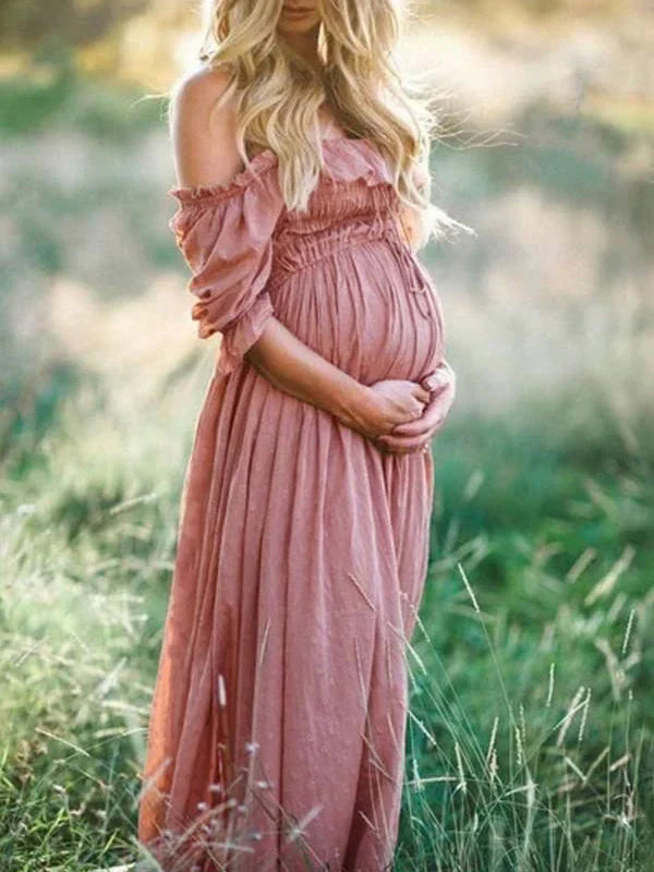Chic off-shoulder maxi maternity dress for women. Flowy, comfortable pregnancy wear, a stylish choice for expectant mothers.
