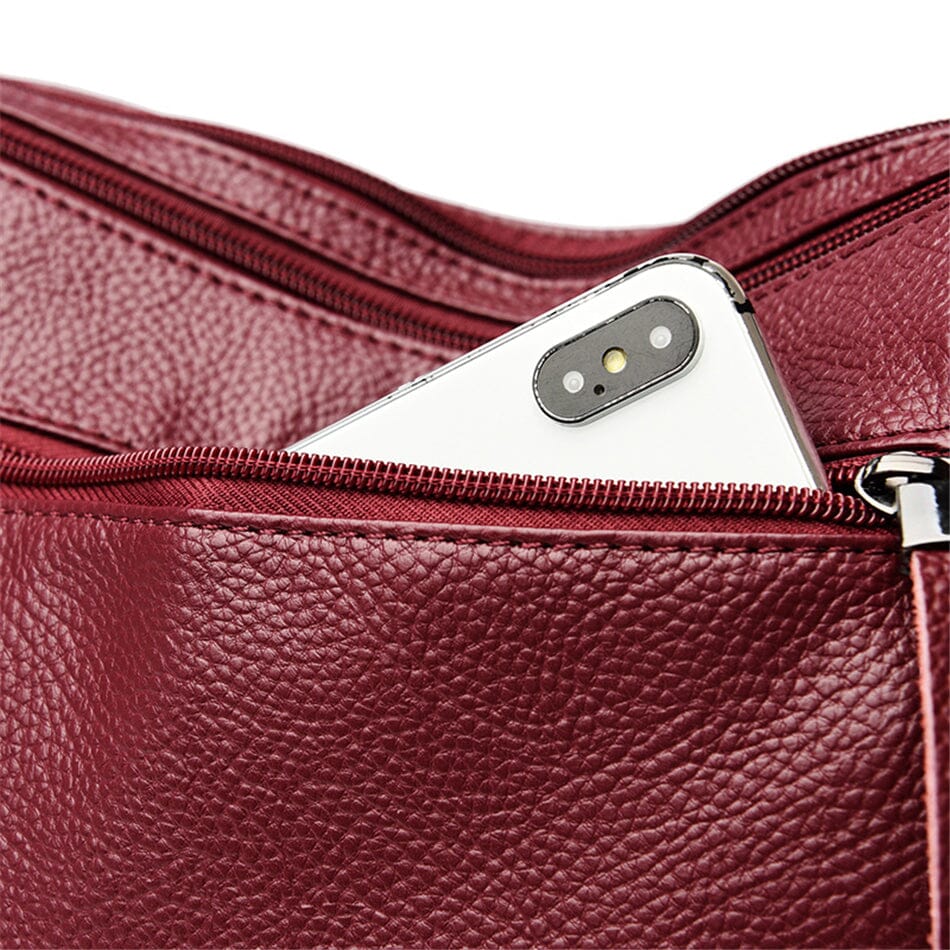 Luxury women's genuine leather crossbody, stylish and functional everyday bag.