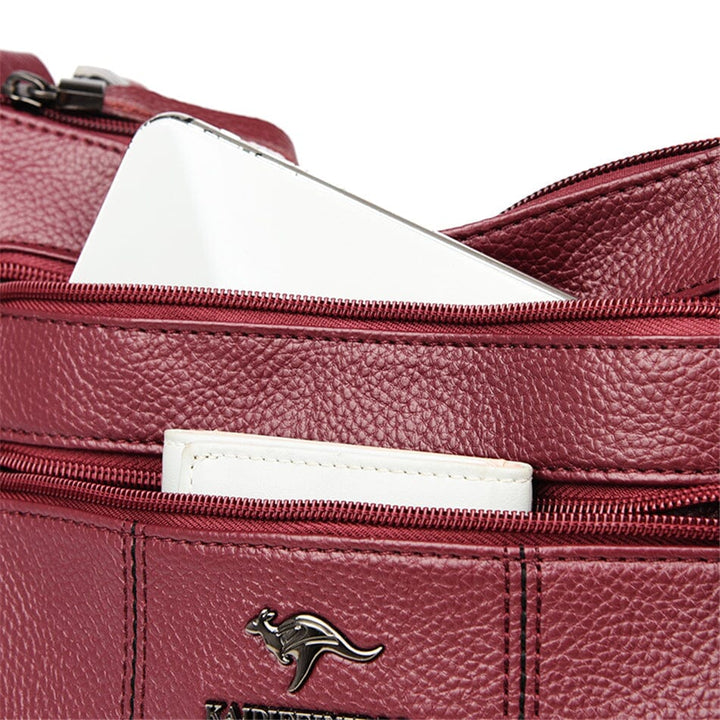 Elegant genuine leather tote bag, perfect for professional women, fashion accessory.