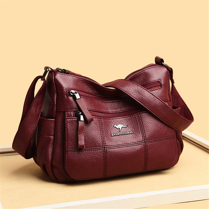 Sophisticated genuine leather crossbody bag for women, a premium fashion accessory.