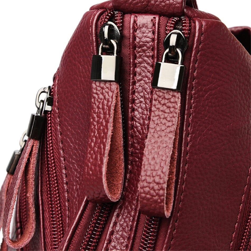 Chic genuine leather handbag for women, a luxury purse in a rich brown tone.