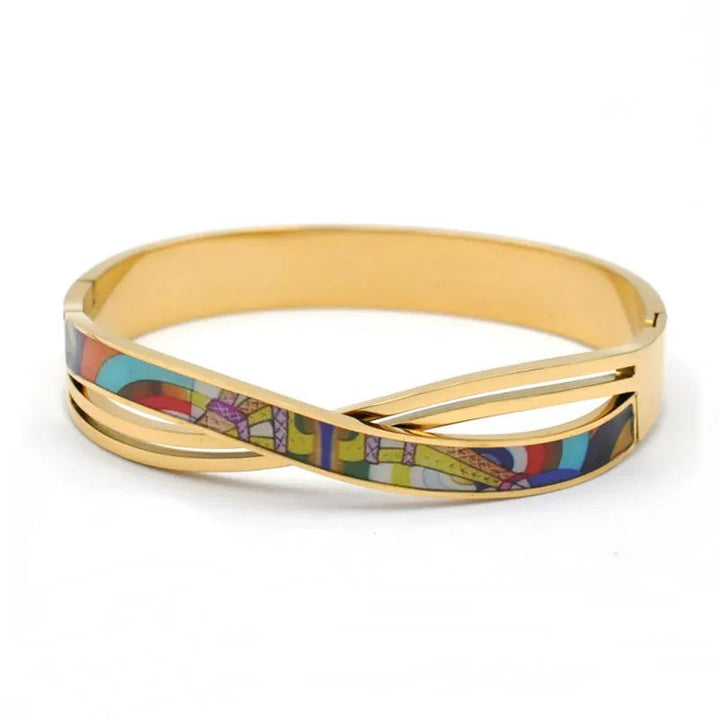 Women's gold cuff bracelet with a unique geode charm, a natural stone fashion accessory and gift for her.
