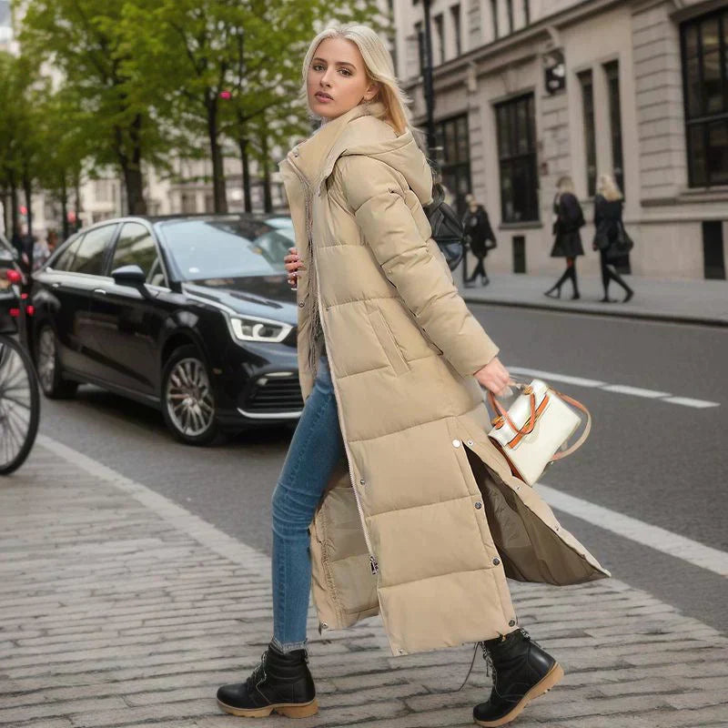 Women's elegant long winter coat, Isabella, providing cozy comfort & style in cold weather.