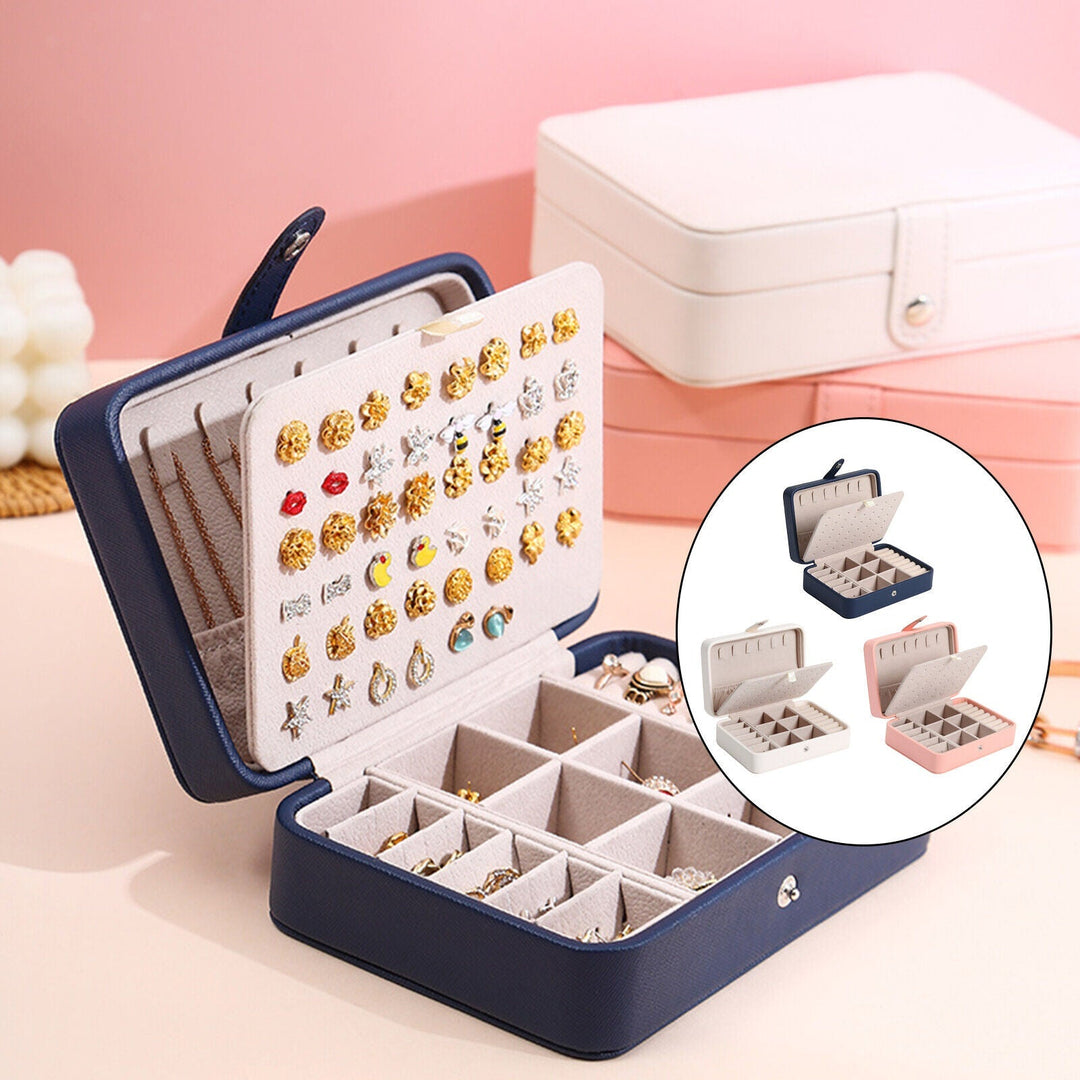 Blue leather flip-top jewelry box, a stylish and secure solution for women's precious items.