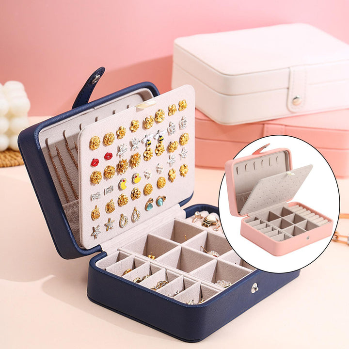 Luxury flip-top jewelry storage box in blue leather, perfect for women's home organization.