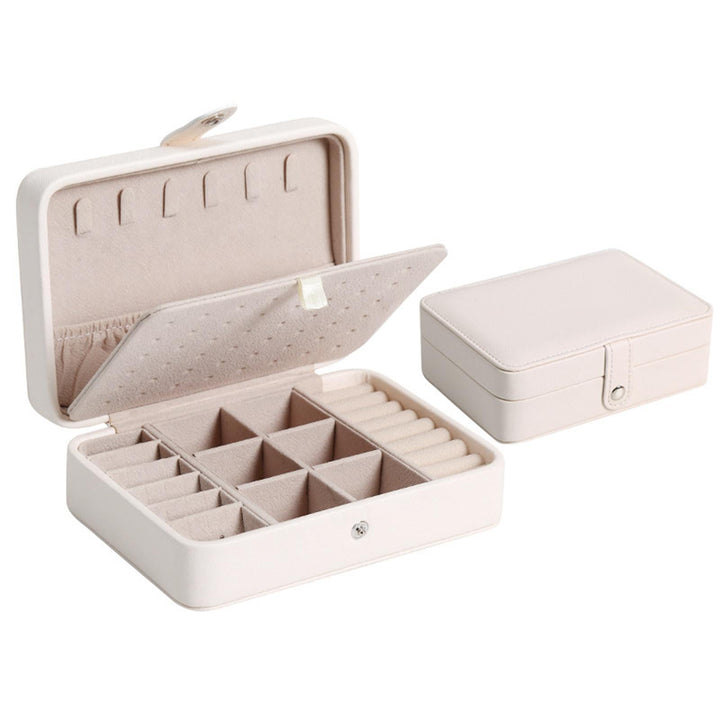 Chic leather flip-top jewelry box for women, ideal for vanity decor and accessory storage.