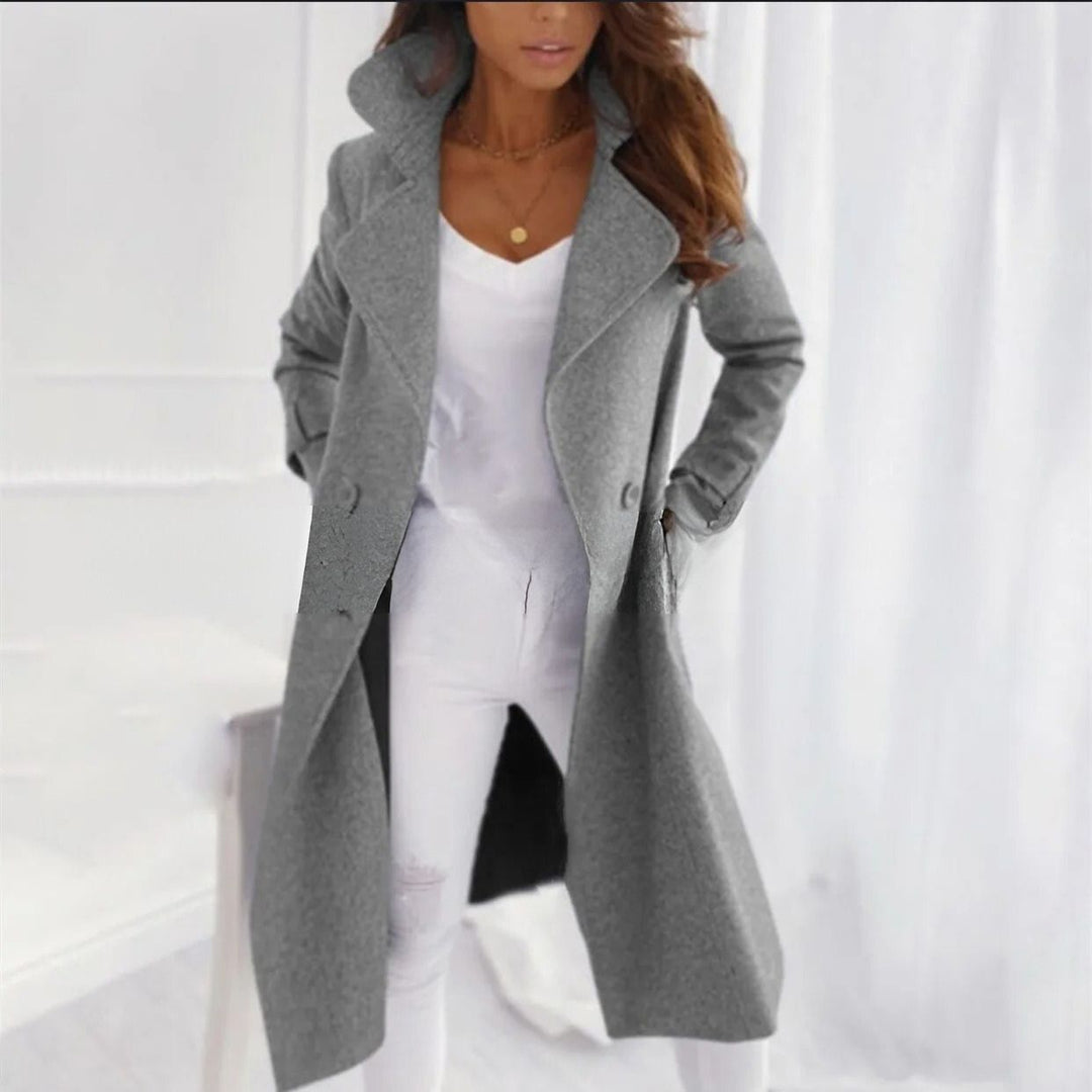 Elegant long women's coat with classic turned-down collar. Perfect for autumn & winter fashion.